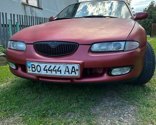 Красный Мазда Кседос 6, объемом двигателя 2 л и пробегом 430 тыс. км за 1350 $, фото 1 на Automoto.ua