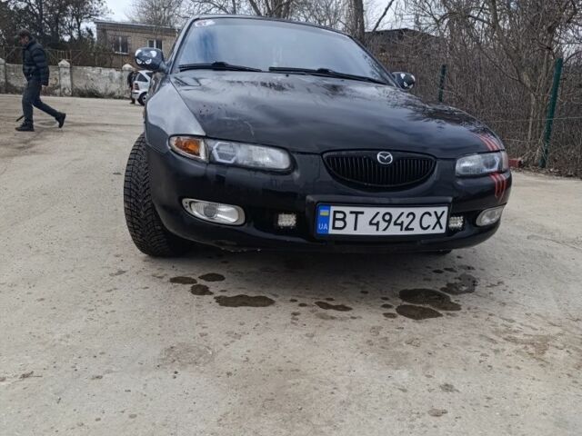 Сірий Мазда Кседос 6, об'ємом двигуна 2 л та пробігом 344 тис. км за 2800 $, фото 1 на Automoto.ua