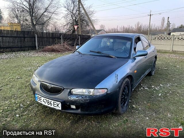 Серый Мазда Кседос 6, объемом двигателя 2 л и пробегом 0 тыс. км за 1350 $, фото 1 на Automoto.ua