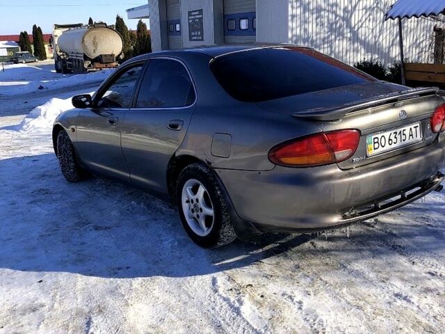 Серый Мазда Кседос 6, объемом двигателя 1.6 л и пробегом 235 тыс. км за 1950 $, фото 1 на Automoto.ua