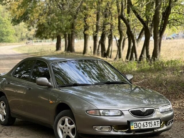 Сірий Мазда Кседос 6, об'ємом двигуна 1.6 л та пробігом 300 тис. км за 1250 $, фото 1 на Automoto.ua