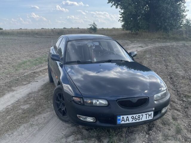 Синий Мазда Кседос 6, объемом двигателя 2 л и пробегом 384 тыс. км за 1603 $, фото 1 на Automoto.ua