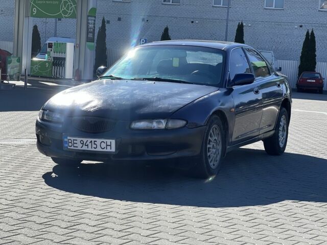 Синий Мазда Кседос 6, объемом двигателя 2 л и пробегом 325 тыс. км за 870 $, фото 1 на Automoto.ua