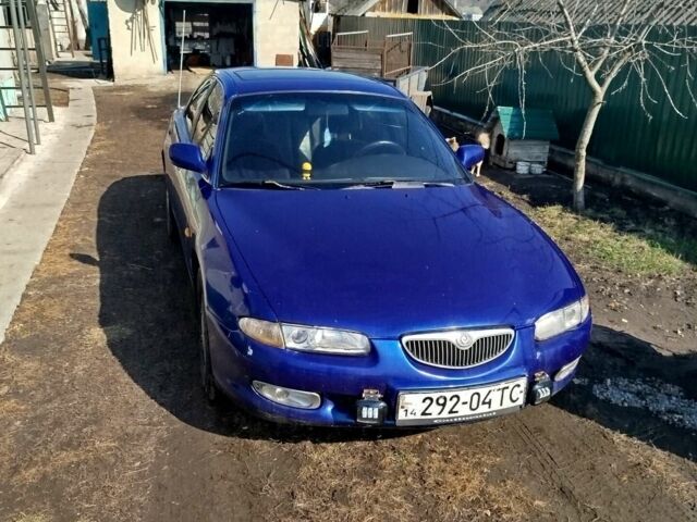 Синий Мазда Кседос 6, объемом двигателя 2 л и пробегом 350 тыс. км за 1750 $, фото 1 на Automoto.ua