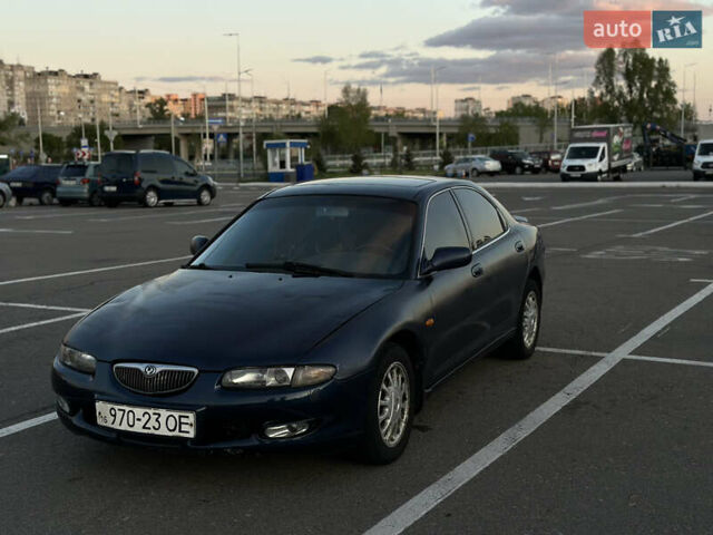 Синий Мазда Кседос 6, объемом двигателя 2 л и пробегом 558 тыс. км за 1499 $, фото 1 на Automoto.ua