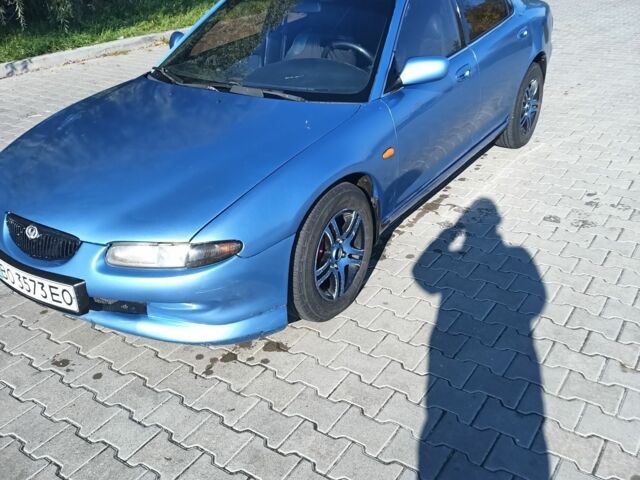 Синій Мазда Кседос 6, об'ємом двигуна 2 л та пробігом 300 тис. км за 1126 $, фото 1 на Automoto.ua