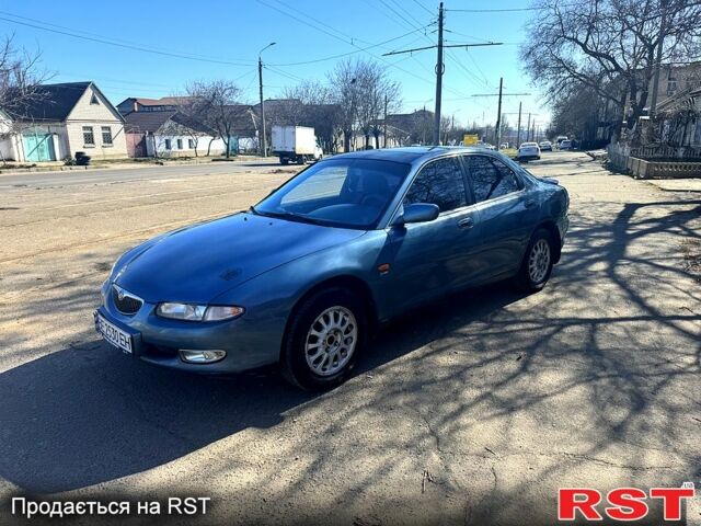 Синий Мазда Кседос 6, объемом двигателя 2 л и пробегом 360 тыс. км за 2499 $, фото 1 на Automoto.ua