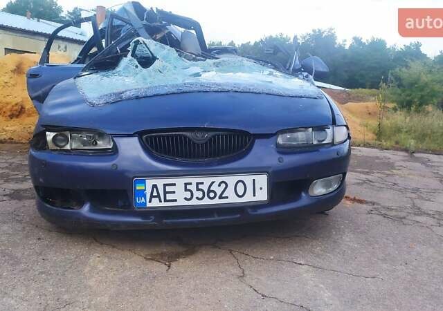 Синий Мазда Кседос 6, объемом двигателя 2 л и пробегом 300 тыс. км за 1200 $, фото 1 на Automoto.ua