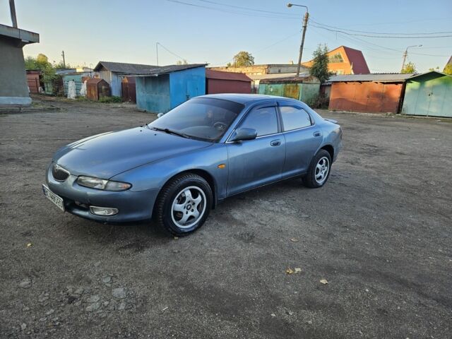 Синий Мазда Кседос 6, объемом двигателя 2 л и пробегом 350 тыс. км за 2257 $, фото 1 на Automoto.ua