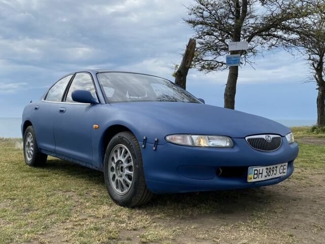 Синий Мазда Кседос 6, объемом двигателя 2 л и пробегом 285 тыс. км за 1800 $, фото 1 на Automoto.ua