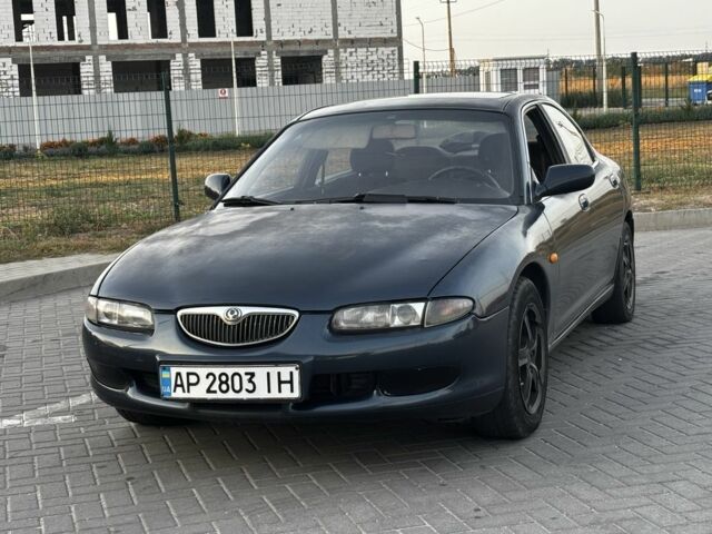 Синій Мазда Кседос 6, об'ємом двигуна 2 л та пробігом 250 тис. км за 2007 $, фото 1 на Automoto.ua