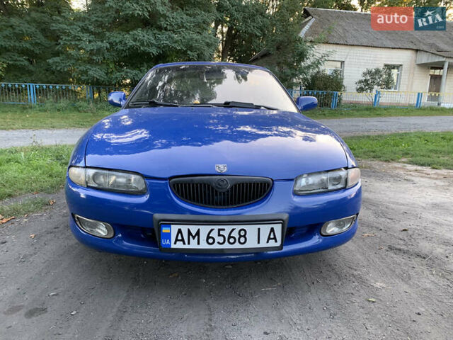 Синий Мазда Кседос 6, объемом двигателя 2 л и пробегом 400 тыс. км за 2100 $, фото 1 на Automoto.ua
