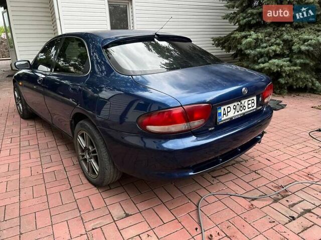 Синий Мазда Кседос 6, объемом двигателя 2 л и пробегом 150 тыс. км за 2000 $, фото 1 на Automoto.ua
