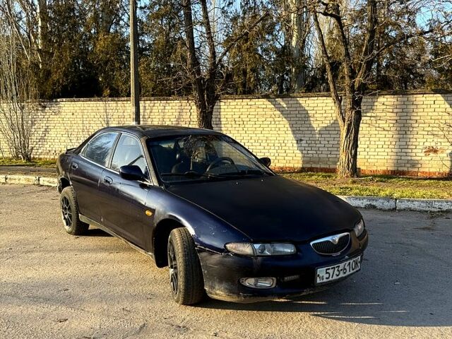 Синий Мазда Кседос 6, объемом двигателя 2 л и пробегом 520 тыс. км за 900 $, фото 1 на Automoto.ua