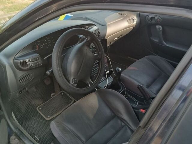 Синій Мазда Кседос 6, об'ємом двигуна 1.6 л та пробігом 3 тис. км за 2800 $, фото 1 на Automoto.ua