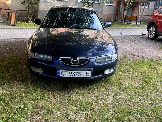 Синій Мазда Кседос 6, об'ємом двигуна 1.6 л та пробігом 0 тис. км за 1300 $, фото 1 на Automoto.ua