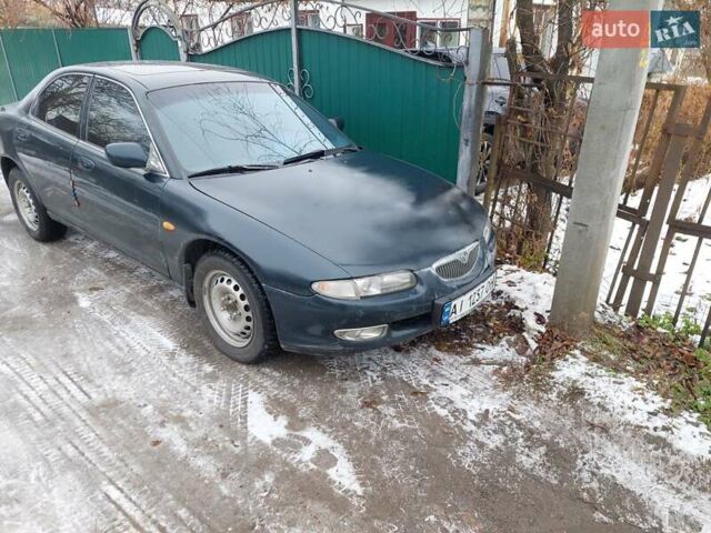 Синій Мазда Кседос 6, об'ємом двигуна 2 л та пробігом 331 тис. км за 2500 $, фото 1 на Automoto.ua