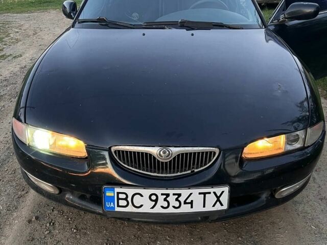 Синий Мазда Кседос 6, объемом двигателя 2 л и пробегом 381 тыс. км за 1200 $, фото 1 на Automoto.ua