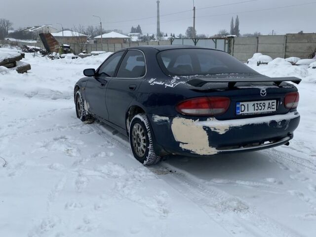 Синий Мазда Кседос 6, объемом двигателя 1.6 л и пробегом 415 тыс. км за 2100 $, фото 1 на Automoto.ua