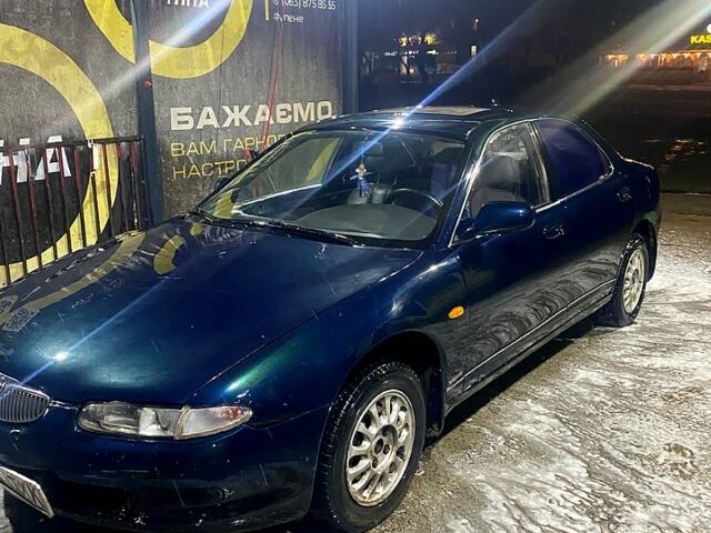 Синій Мазда Кседос 6, об'ємом двигуна 1.6 л та пробігом 200 тис. км за 1400 $, фото 1 на Automoto.ua