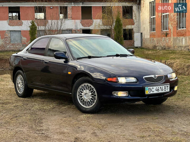 Синий Мазда Кседос 6, объемом двигателя 2 л и пробегом 300 тыс. км за 2250 $, фото 1 на Automoto.ua