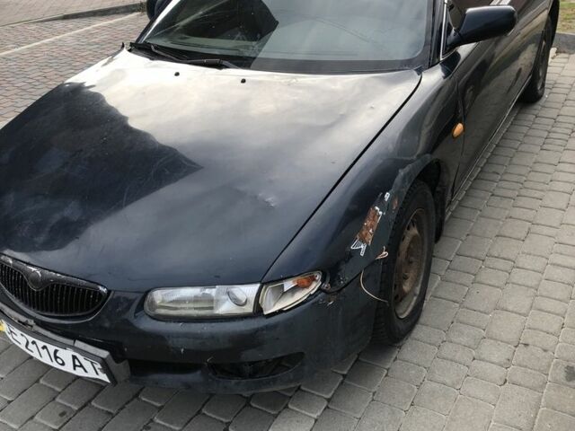 Зелений Мазда Кседос 6, об'ємом двигуна 2 л та пробігом 243 тис. км за 1100 $, фото 1 на Automoto.ua