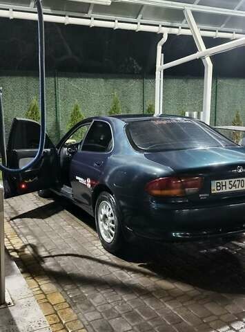 Зеленый Мазда Кседос 6, объемом двигателя 2 л и пробегом 300 тыс. км за 2600 $, фото 1 на Automoto.ua