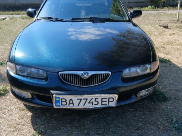 Зелений Мазда Кседос 6, об'ємом двигуна 2 л та пробігом 375 тис. км за 3100 $, фото 1 на Automoto.ua