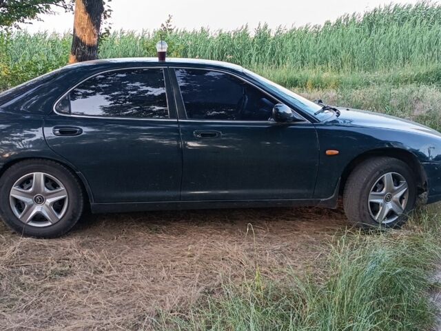 Зелений Мазда Кседос 6, об'ємом двигуна 1.6 л та пробігом 290 тис. км за 2000 $, фото 1 на Automoto.ua