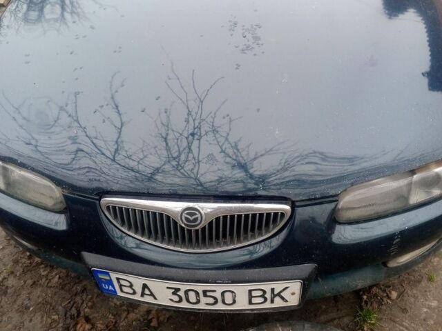 Зелений Мазда Кседос 6, об'ємом двигуна 2 л та пробігом 353 тис. км за 1700 $, фото 1 на Automoto.ua