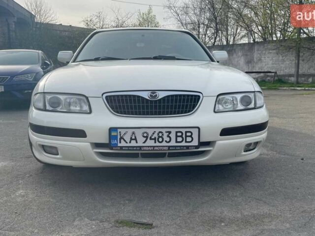 Белый Мазда Кседос 9, объемом двигателя 2.5 л и пробегом 410 тыс. км за 3000 $, фото 1 на Automoto.ua