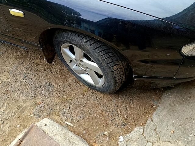 Чорний Мазда Кседос 9, об'ємом двигуна 2.5 л та пробігом 0 тис. км за 2000 $, фото 1 на Automoto.ua