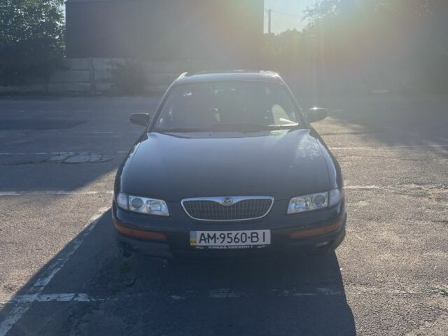 Черный Мазда Кседос 9, объемом двигателя 2 л и пробегом 3 тыс. км за 1800 $, фото 1 на Automoto.ua