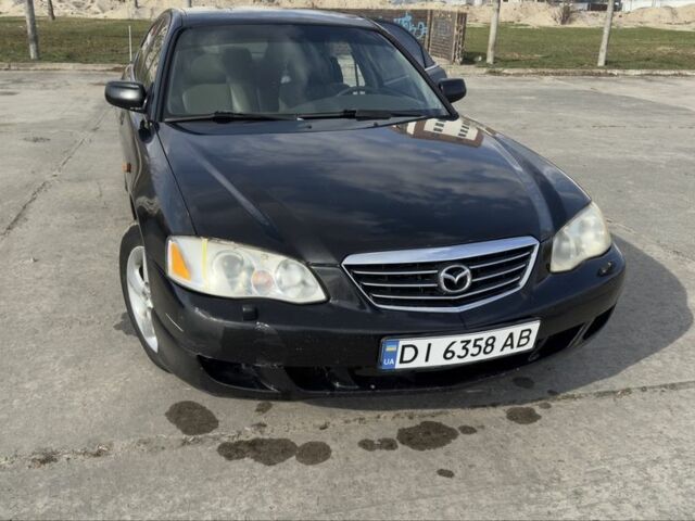 Чорний Мазда Кседос 9, об'ємом двигуна 2.5 л та пробігом 224 тис. км за 2099 $, фото 1 на Automoto.ua