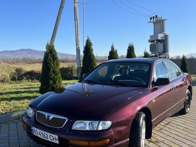 Красный Мазда Кседос 9, объемом двигателя 2.5 л и пробегом 200 тыс. км за 1850 $, фото 1 на Automoto.ua