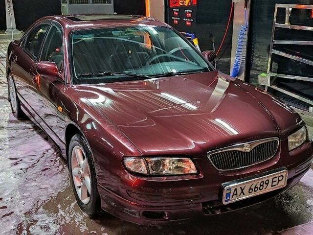 Красный Мазда Кседос 9, объемом двигателя 2 л и пробегом 388 тыс. км за 2931 $, фото 1 на Automoto.ua