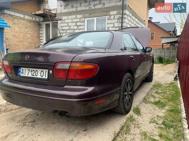 Красный Мазда Кседос 9, объемом двигателя 2 л и пробегом 285 тыс. км за 2000 $, фото 1 на Automoto.ua