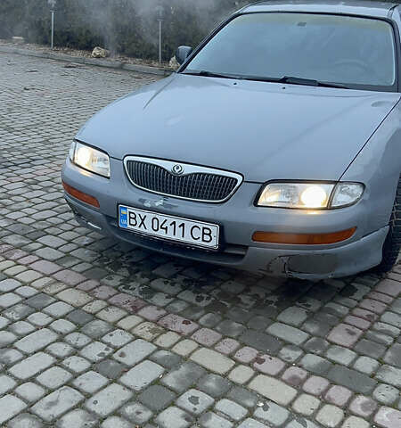 Сірий Мазда Кседос 9, об'ємом двигуна 2 л та пробігом 200 тис. км за 600 $, фото 1 на Automoto.ua