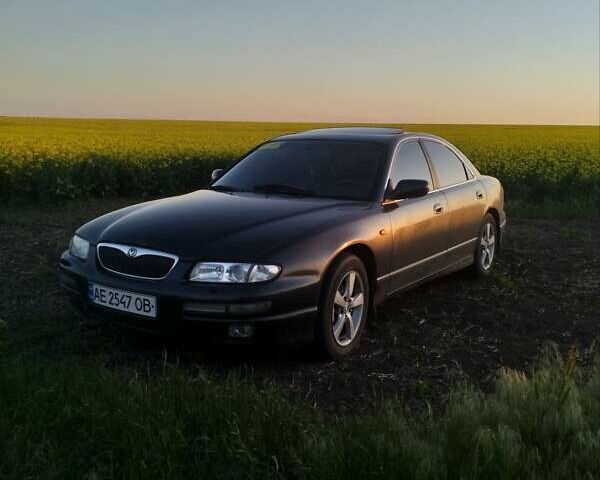 Сірий Мазда Кседос 9, об'ємом двигуна 2.5 л та пробігом 360 тис. км за 2300 $, фото 1 на Automoto.ua