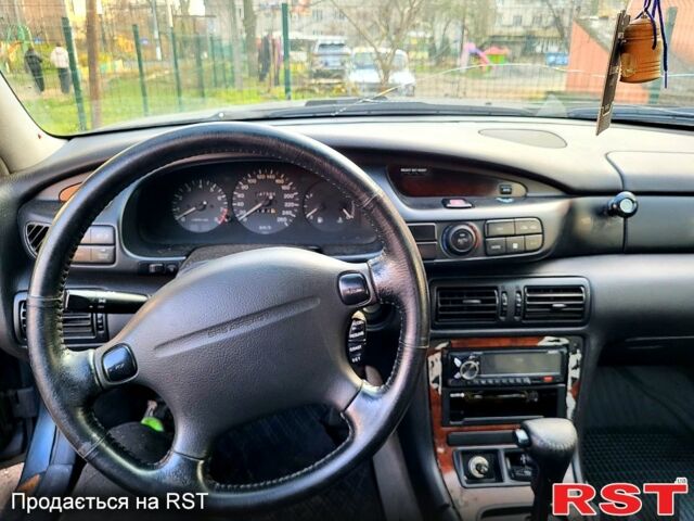 Сірий Мазда Кседос 9, об'ємом двигуна 2.5 л та пробігом 0 тис. км за 1000 $, фото 1 на Automoto.ua