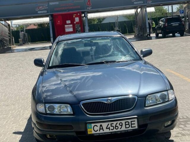 Сірий Мазда Кседос 9, об'ємом двигуна 2.5 л та пробігом 250 тис. км за 1450 $, фото 1 на Automoto.ua