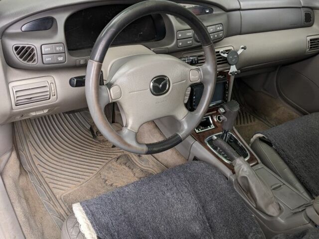 Серый Мазда Кседос 9, объемом двигателя 2 л и пробегом 200 тыс. км за 967 $, фото 1 на Automoto.ua