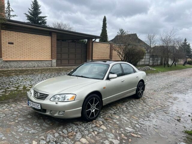 Серый Мазда Кседос 9, объемом двигателя 2.5 л и пробегом 280 тыс. км за 2800 $, фото 1 на Automoto.ua