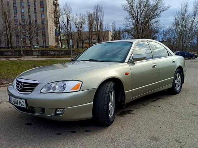 Серый Мазда Кседос 9, объемом двигателя 2.5 л и пробегом 157 тыс. км за 4300 $, фото 1 на Automoto.ua