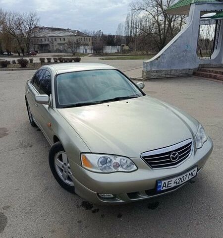 Серый Мазда Кседос 9, объемом двигателя 2.5 л и пробегом 157 тыс. км за 4300 $, фото 1 на Automoto.ua