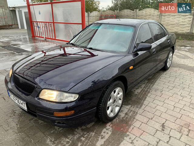 Синий Мазда Кседос 9, объемом двигателя 2 л и пробегом 272 тыс. км за 1950 $, фото 1 на Automoto.ua