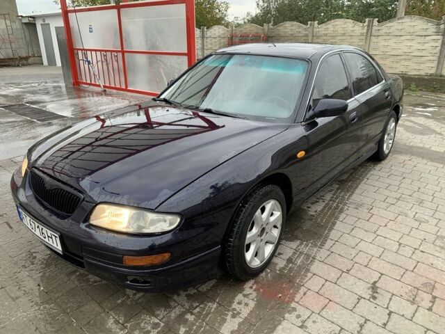 Синий Мазда Кседос 9, объемом двигателя 2 л и пробегом 407 тыс. км за 1950 $, фото 1 на Automoto.ua