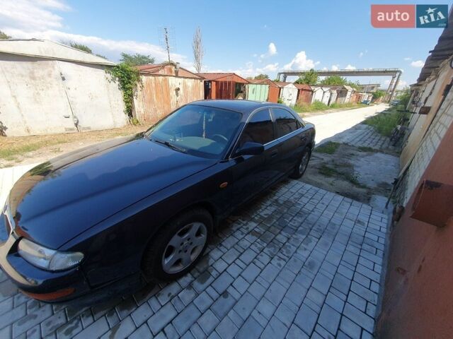 Синий Мазда Кседос 9, объемом двигателя 2.5 л и пробегом 350 тыс. км за 1600 $, фото 1 на Automoto.ua