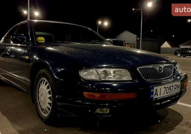 Синий Мазда Кседос 9, объемом двигателя 2.5 л и пробегом 380 тыс. км за 2100 $, фото 1 на Automoto.ua