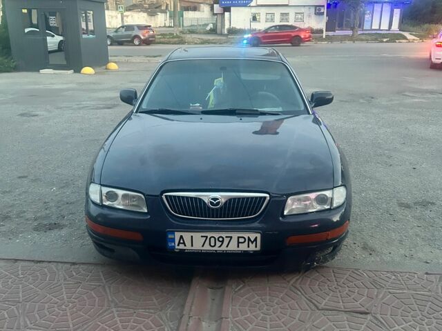 Синій Мазда Кседос 9, об'ємом двигуна 2.5 л та пробігом 1 тис. км за 2207 $, фото 1 на Automoto.ua